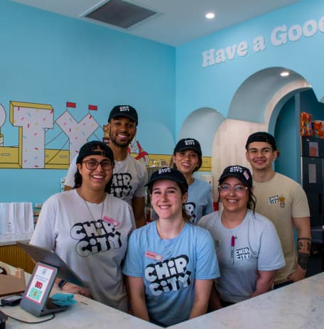 Friendly Chip City Workers Behind Counter